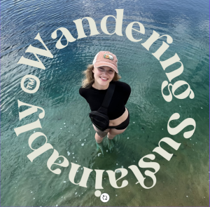 Girl in pink hat stands in water looking up into camera, the text "Wandering Sustainably" surrounds her